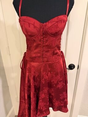 House of CB corset dress in a‎ deep red floral pattern